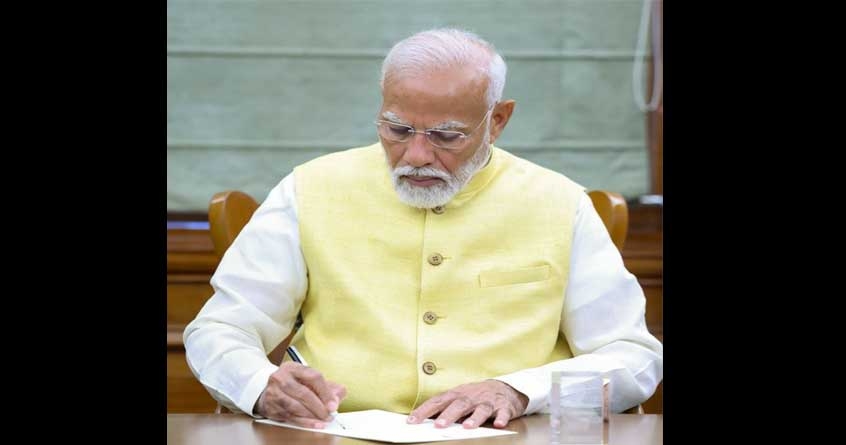PM Modi signs file on Kisan Welfare